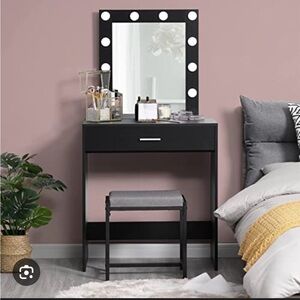 Black Vanity with 5 adjustable light settings. New in box.